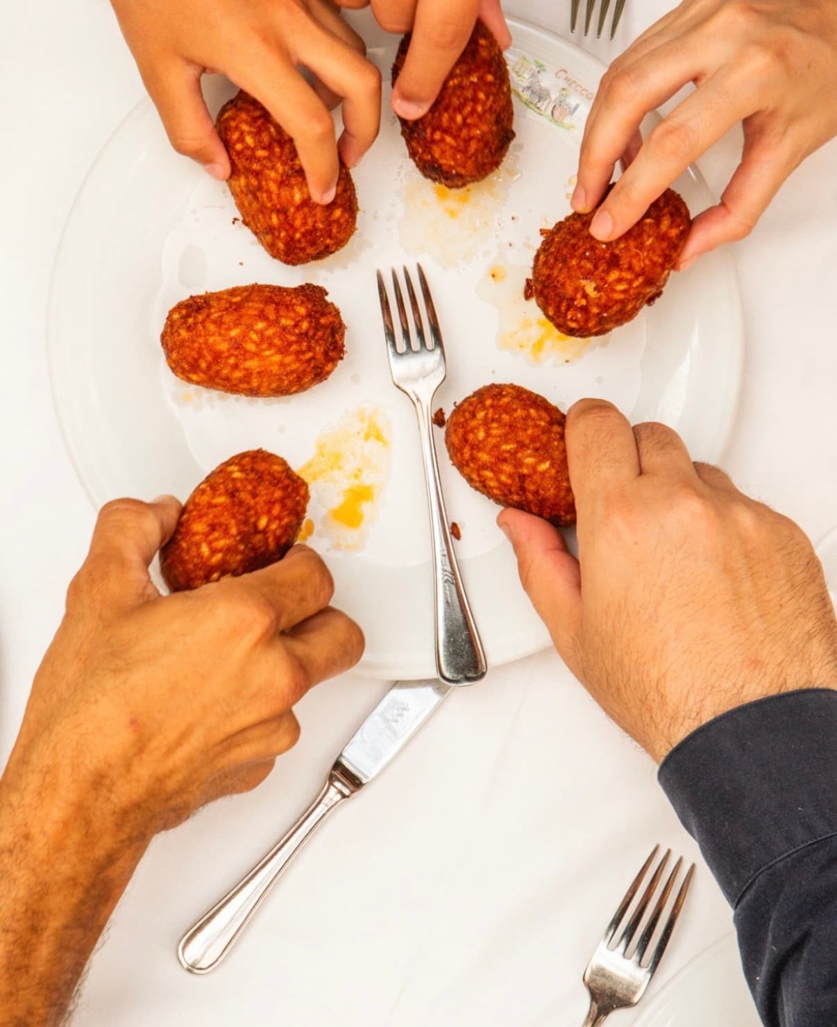 Supplì mit sugo und 30 Monate gereiftem parmigiano