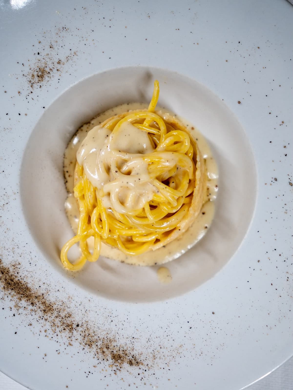 Cacio e pepe con tonnarello fresco e pecorino stagionato