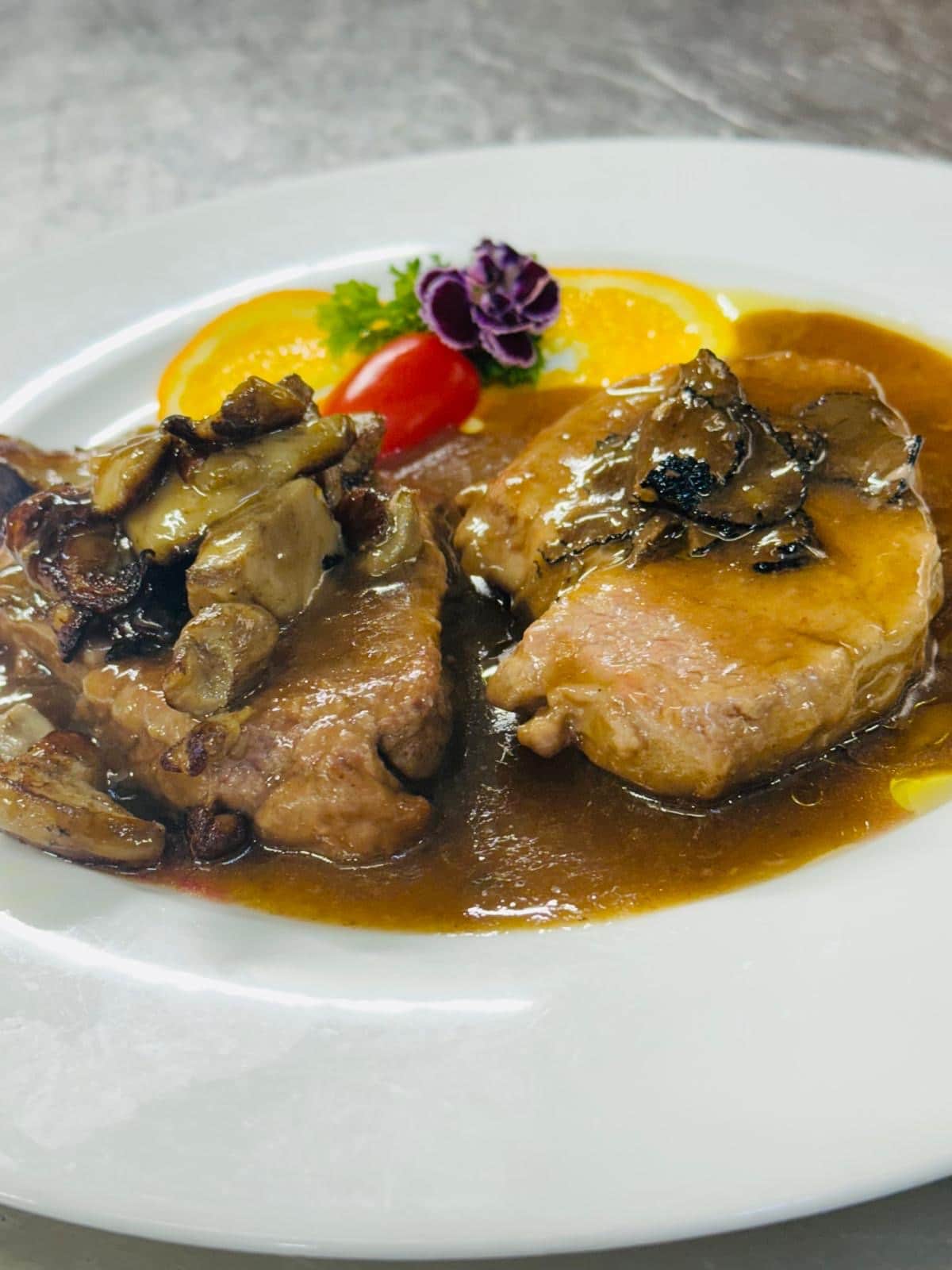 Duo of beef and veal fillets with porcini and marsala