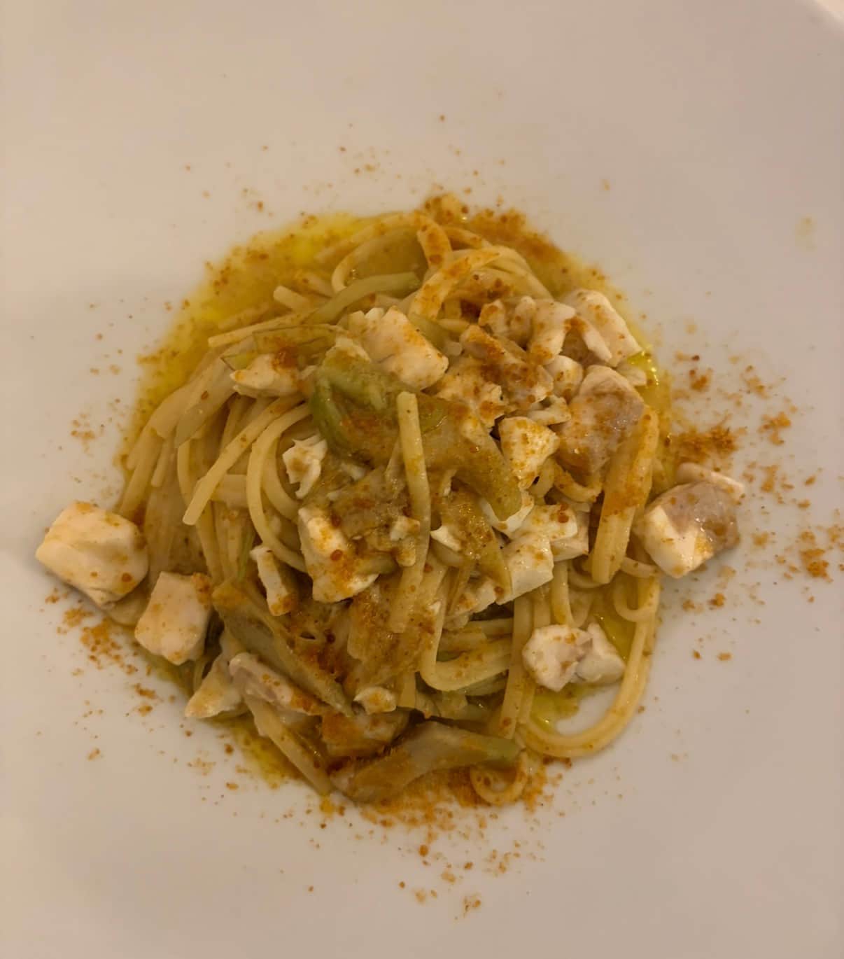 Tagliolini with zucchini flowers, sea bass and bottarga di muggine